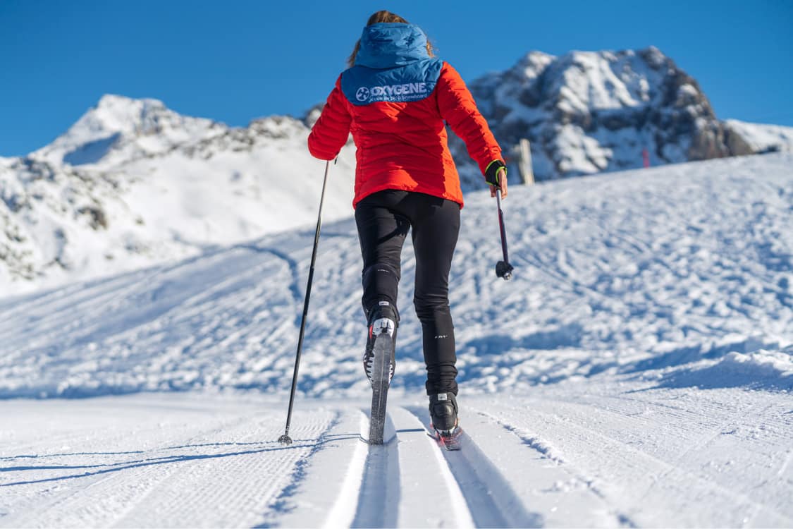 A person cross country skiing.